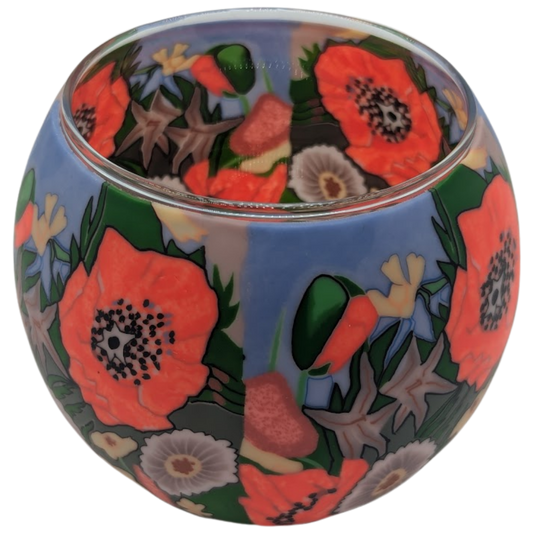 Decorative glass globe with floral design on a white background