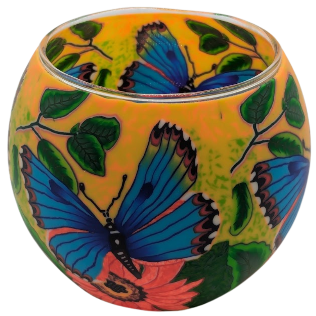 Decorative glass globe with butterfly and leaf pattern on a white background