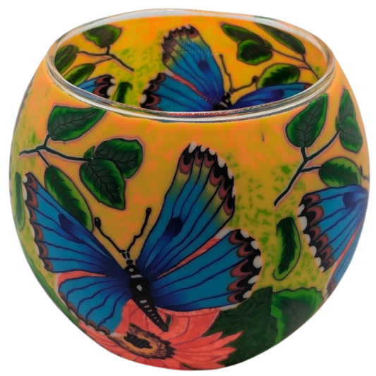 Decorative glass globe with butterfly and leaf pattern on a white background