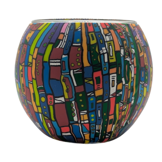 Colorful patterned glass bowl on a white background