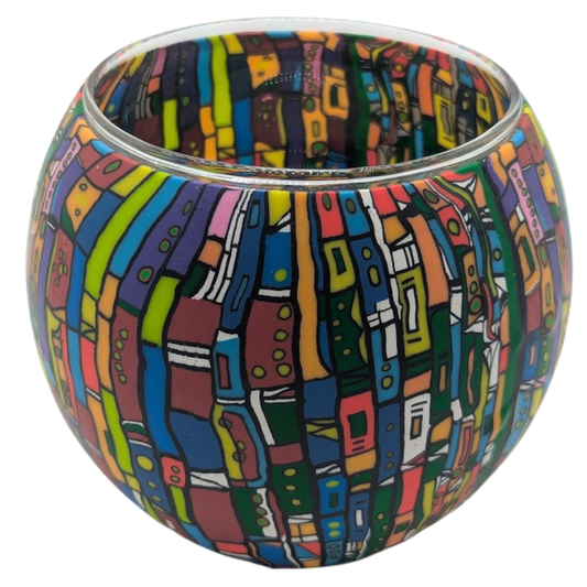 Colorful patterned glass bowl on a white background