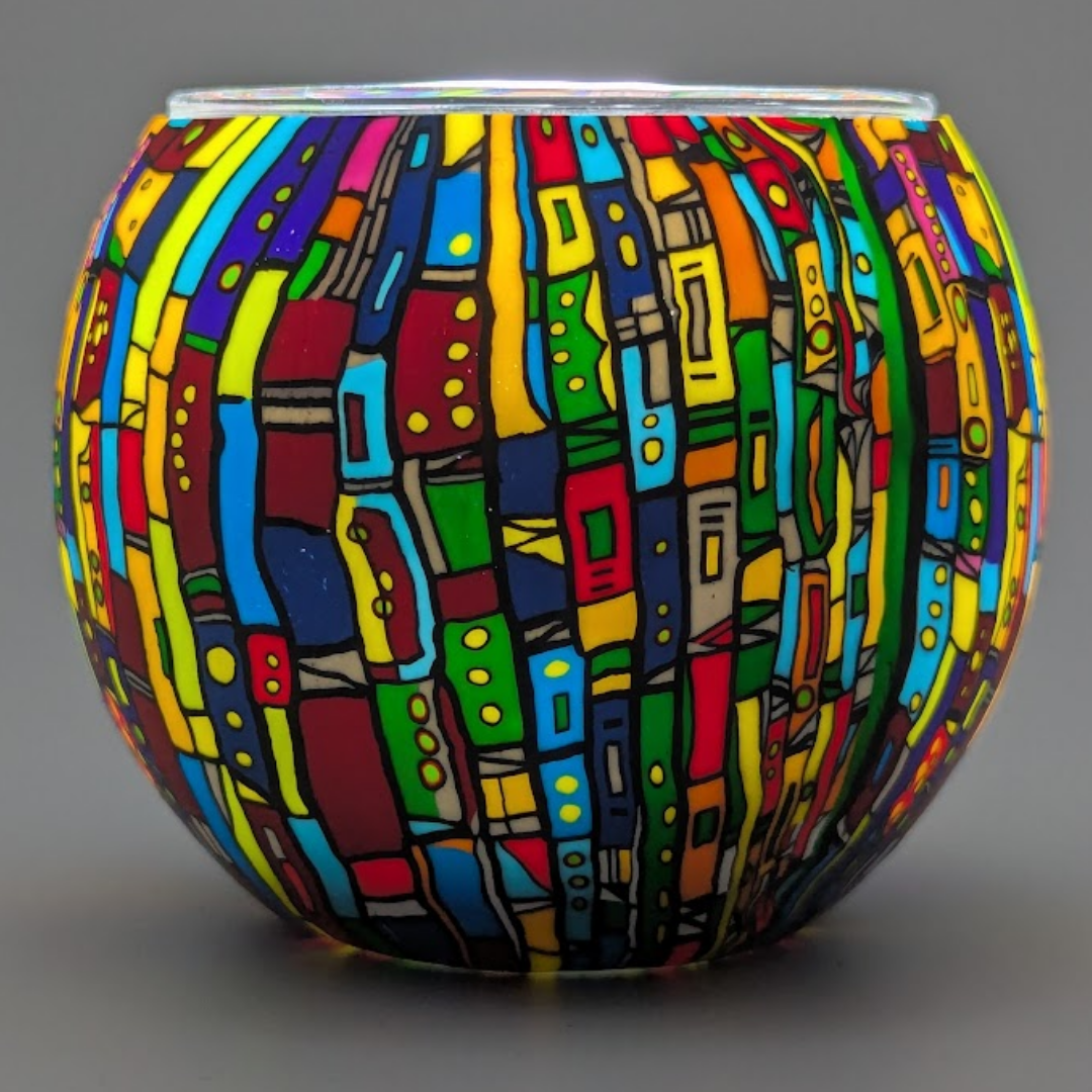 Colorful patterned bowl on a gray background