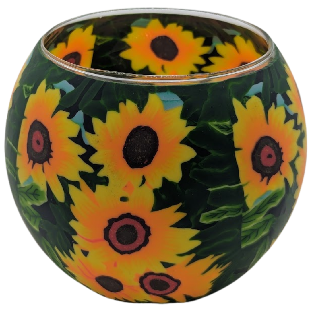 Decorative glass globe with sunflower pattern on a white background