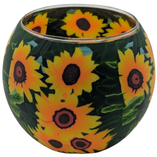 Decorative glass globe with sunflower pattern on a white background