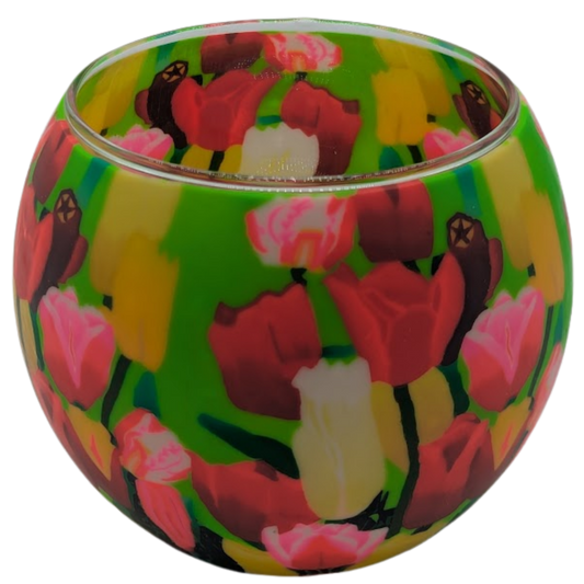 Colorful glass globe with floral pattern on a white background